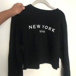 Brandy Melville “New York Soho” cropped hoodie